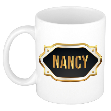 Naam cadeau mok / beker Nancy met gouden embleem 300 ml