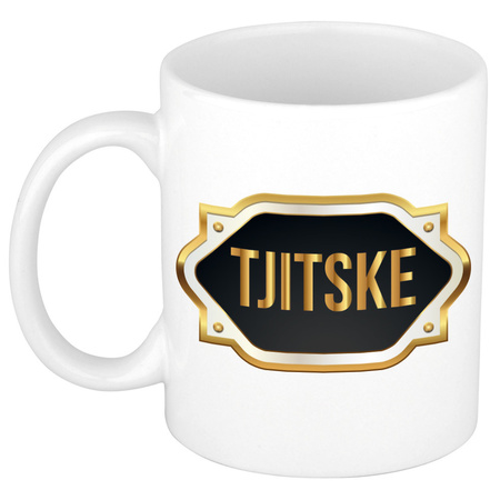 Name mug Tjitske with golden emblem 300 ml